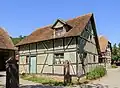 Fachwerkhaus aus Kœtzingue (Gebäude Nr. 19), ausgestellt im Écomusée d’Alsace in Ungersheim