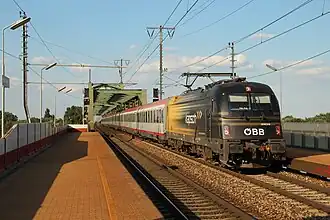 1216.210 „Kapsch“ mit EC 173 in Wien Praterkai