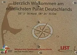Hinweistafel des Zipfelbundes am nördlichsten Punkt Deutschlands (Ellenbogen auf Sylt)