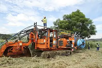 Eine Grabenfräse in Südafrika