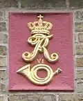Posthorn und Monogramm des dänischen Königs Friedrich VI. (Am Mittelburgwall)