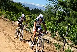 Andrea Huser zusammen mit Russell De Jager beim Cape Epic Prolog in Nitída (2012)