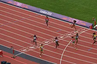 Zieleinlauf Vorlauf drei: Yomara Hinestroza (Bahn 2), Saruba Colley (B. 3), Veronica Campbell-Brown (B. 4), Gloria Asumnu (B. 5), Iwet Lalowa (B. 6), Abiodun Oyepitan (B. 7), Phobey Kutu-Akoi (B. 8), Lina Grinčikaitė (B. 9)