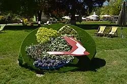 Logo, aus Blumen gebildet