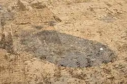 Abfallgrube im Planum