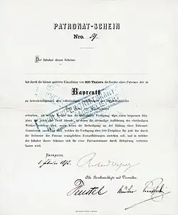 Patronat-Schein zur Finanzierung der Festspiele in Bayreuth. Der am 1. Februar 1872 aufgelegte Patronat-Schein wurde von Richard Wagner und drei Bevollmächtigten und Verwaltern im Original signiert, u. a. von dem Bankier Friedrich Feustel. Durch Zahlung von 300 Thaler erwarb der Inhaber des Scheins „die Rechte eines Patrones der in Bayreuth zu bewerkstelligenden drei vollständigen Aufführungen des Bühnenspieles Der Ring des Nibelungen“.
