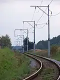 Fahrleitung mit Stahlrohrmasten von 1937/38 bei Bežerovice (2011)