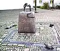 Brunnenstein (Chamäleonbrunnen) in Halle (Saale), Geiststraße (1992)[3]