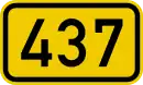 B437