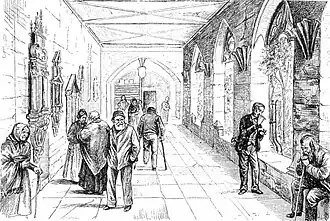 Bürgerhospitaliten beim Luftschnappen im Kreuzgang des ehemaligen Dominikanerklosters, um 1850.