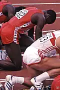 Start im 100-Meter-Rennen: Carl Lewis (links in Rot) und Christian Haas (weißes Trikot)