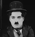 Charlie Chaplin als The Tramp, 1921 (in The Kid)