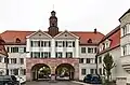 Torhaus mit Durchfahrt der zentralen Hausgruppe der Gartenstadt Werderau