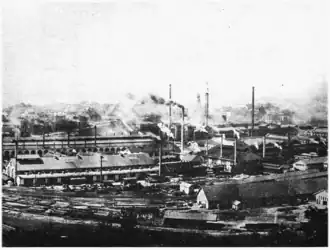 Fabrik- mit Gleisanlagen (aus: L’Homme et la Terre, Die Menschen und die Erde, Band 5, Élisée Reclus, ca. 1900)