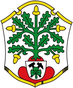 Herne (1937–1975): Das Kleeblatt auf dem Wappenschild im Fuß verweist auf die Zeche Shamrock