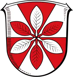 In silbern und rot sechsfach balkenweise geständertem Schild, ein Sechsblatt in verwechselten Farben (Hohenroda, DE mit Apfelblättern)