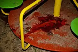 Blutverschmiertes Kinderkarussell