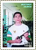 Sportschütze Dilshod Muxtorov auf einer usbekischen Briefmarke von 2001
