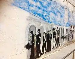 Graffiti im Stadtzentrum von Orestiada zum Thema Vertreibung