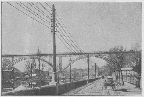 2 × 120 V-Freileitung mit Ölisolatoren entlang der Aare