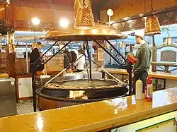Steaks auf dem Schwenkgrill, beim Bayernzelt