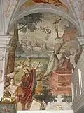 Spätgotisches Wandfresko des auf Jesus Christus hinweisenden Täufers über dem Südportal (um 1540)