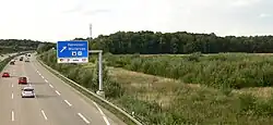 Hinweisschild auf der A 7 zur Raststätte Wülferode in der Gaim