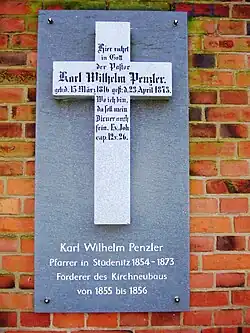 Gedenktafel am Kirchturm