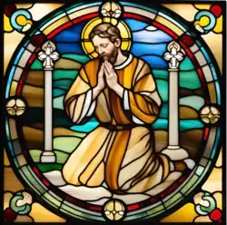 Buntglasbild eines betenden männlichen Heiligen, der zwischen zwei Knochen kniet.