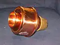 Harmon-Dämpfer mit eingesetztem Stem aus Kupfer
