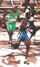 Weltmeister Avard Moncur (Mitte), außerdem auf dem Foto aus dem Halbfinale der Olympischen Spiele 2000: der fünftplatzierte Hamdan al-Bishi (in Grün)