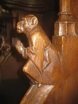 Betender Affe in Mönchskutte (D4).