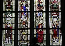 Wappen und die Heiligen (von links nach rechts): Ludwig IX., Hubertus, Cadoc, Juquel, Karl Borromäus und Augustinus