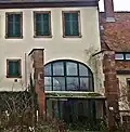 Durchfahrt Herrenhaus Nordseite, mit mittelalterlichen Mauerwerksresten