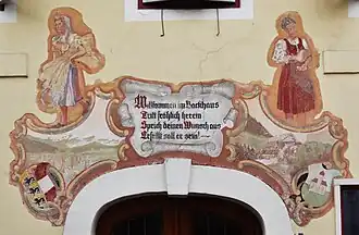 Feldkirchen in Kärnten, Malerei über dem Eingang einer ehemaligen Bäckerei