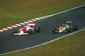 Tambay im RE60 neben Niki Lauda im McLaren, Nürburgring, 1985