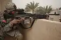 Ein US-Soldat mit einem M240 im Irak