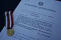 Goldene Verdienstmedaille mit Urkunde des italienischen Innenministeriums