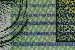 100-Euro-Banknote (ES1) (Vorderseite, in der Nähe der großen Wertzahl)