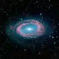 Die Galaxie NGC 4725 aufgenommen vom Spitzer-Weltraumteleskop im infraroten Licht