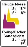 Zeichen am Ortseingang: Heilige Messe und Evangelischer Gottesdienst