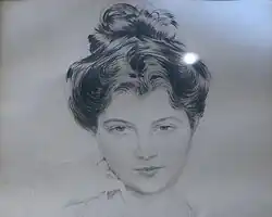 Porträtzeichnung von Jeanne de Flandreysy. Sie hat hochgesteckte Haare und stützt ihr Kinn auf ihre rechte Hand.