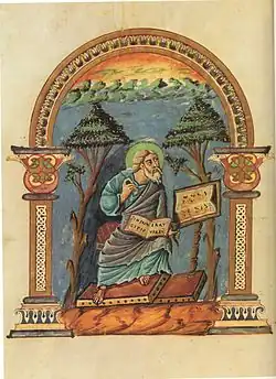 Evangelistenbild aus einer Handschrift des 9. Jahrhunderts: neben antikisierenden Palmetten (im Bogen) „germanische“ Bandornamente (an den Pfeilern).