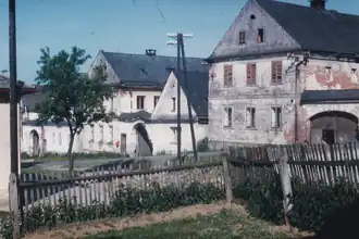 Bebauung unterhalb der Kirche auf der östlichen Seite der Dorfstraße (1966)