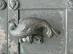 Türgriff in Form eines Pfaus