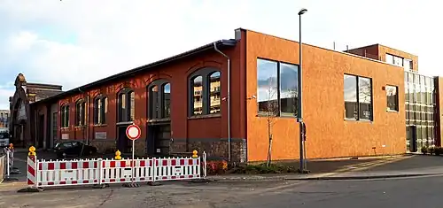 Schweineschlachthalle mit integriertem altem Gebäudebestand