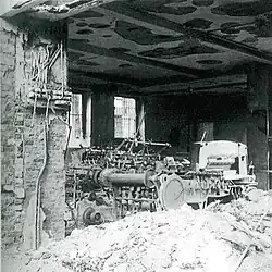 Zerstörtes Firmengebäude nach Bombenangriff im Zweiten Weltkrieg