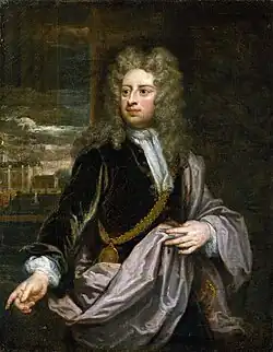 Godfrey Kneller: Selbstporträt mit Perücke, um 1700. In England kommt eine kleinere, etwas eckige Perücke auf, mit kürzerem Haar vor allem an den Seiten.