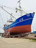 Fischkutter zur Reparatur auf der Slipanlage der Werft in Havneby