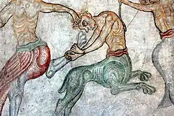 Löwenartiger Kentaur auf einem romanischen Fresko in St. Jakob in Kastelaz, Südtirol